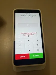 The "Authorisation Code Required" screen, prompting for a numeric PIN to access reports.